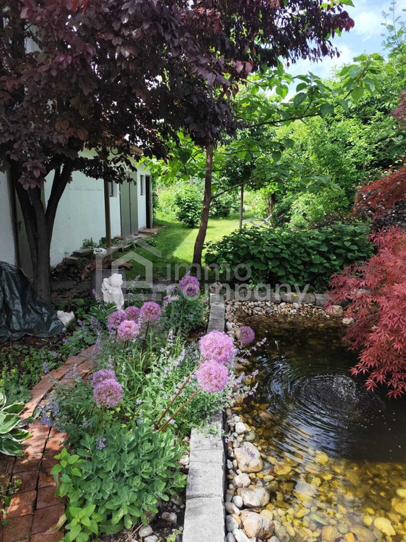 Charmantes  Einfamilienhaus mit wunderschön angelegtem Garten – Foto 12