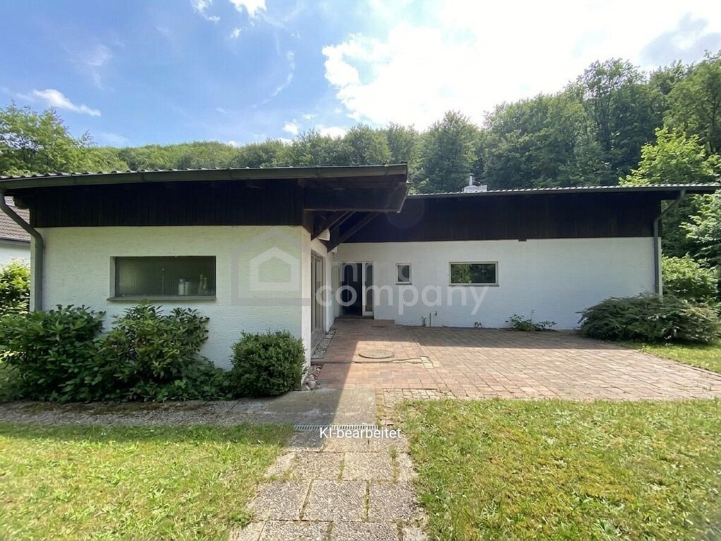 Charmantes unterkellertes Haus mit Entwicklungspotenzial in Weidlingbach mit großem Garten und Waldblick – Foto 1