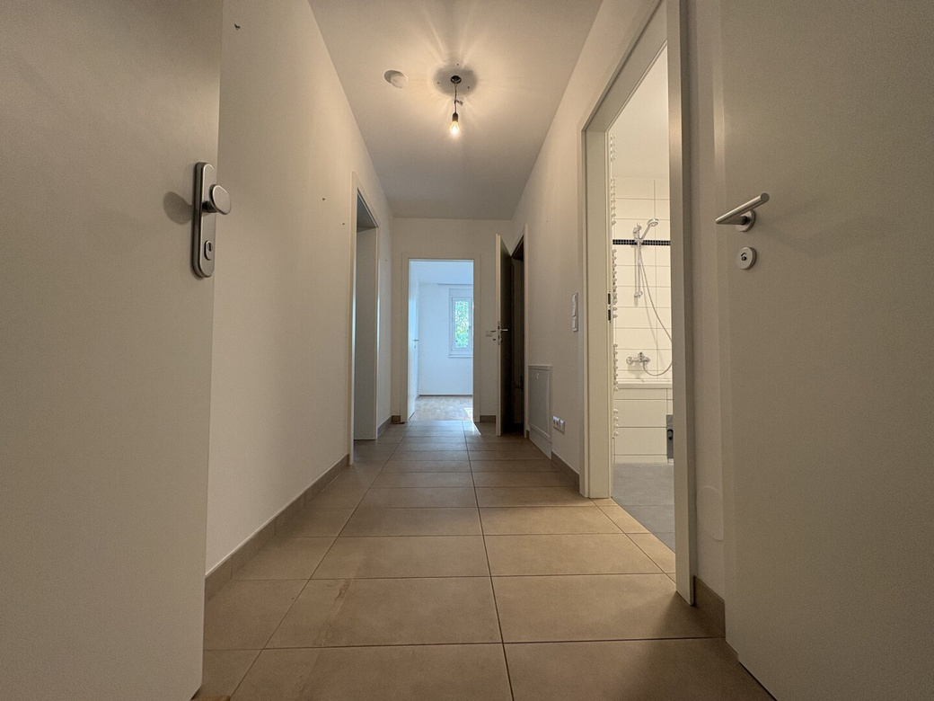 Moderne 2-Zimmer-Wohnung mit Westterrasse & Grünblick (inkl. Garagenplatz) – Foto 10